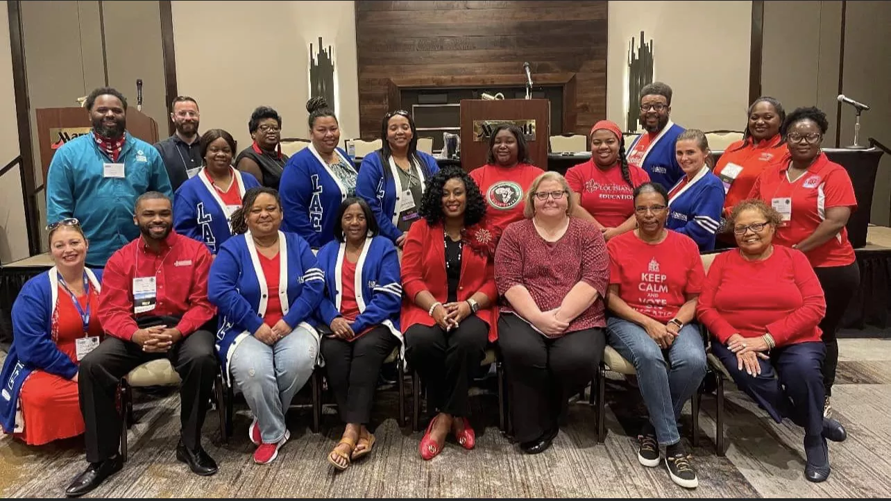 2 rows of LAE leaders smile for the camera